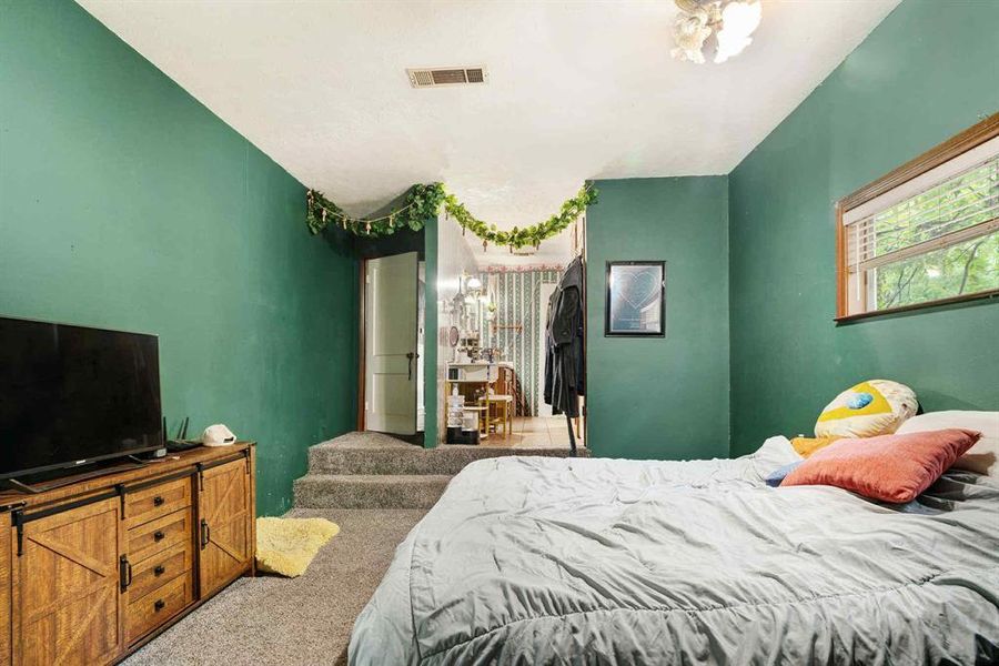 Bedroom with carpet flooring Bedroom with carpet flooring