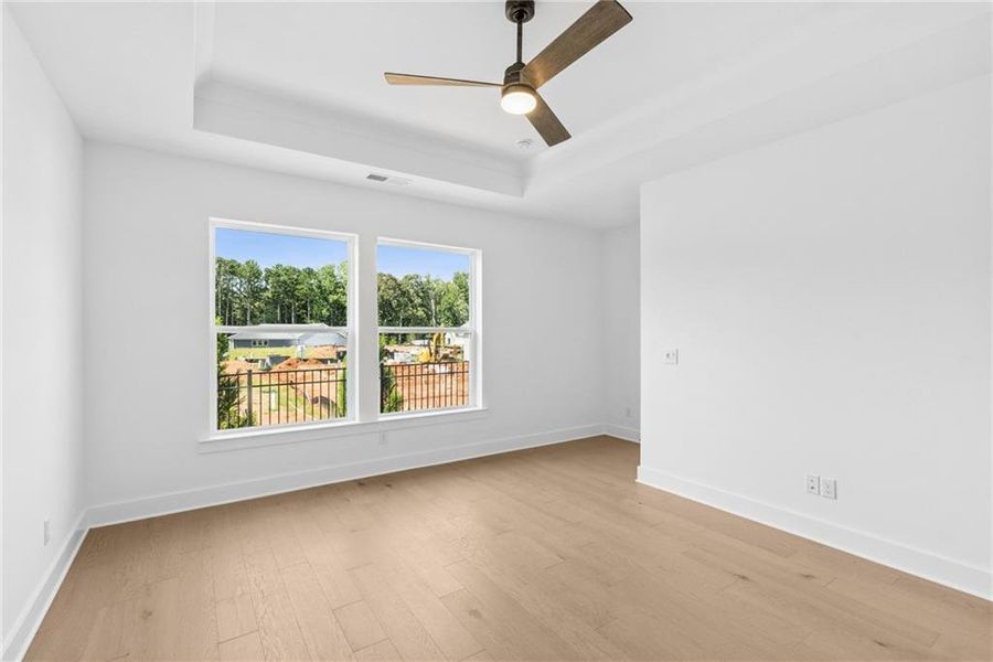 Spacious, unfurnished interior of a new home in Maple Grove at Towne Lake, Woodstock (Image 15).