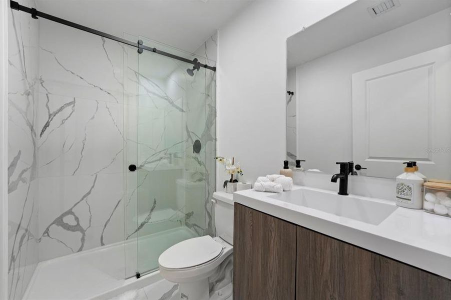 Furnished interior view inside a new home in On Villa Pass, Mascotte (Image 10). Furnished interior view inside a new home in On Villa Pass, Mascotte (Image 10).