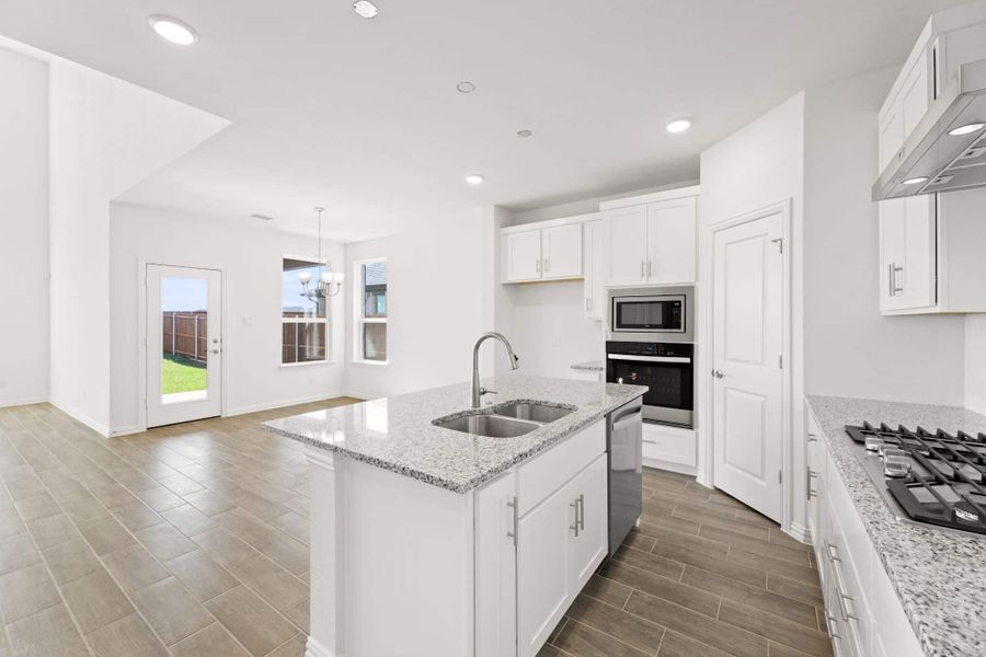Representative furnished interior of a home built from the Salado by UnionMain Homes in Legacy Hills, Celina (Image 10).