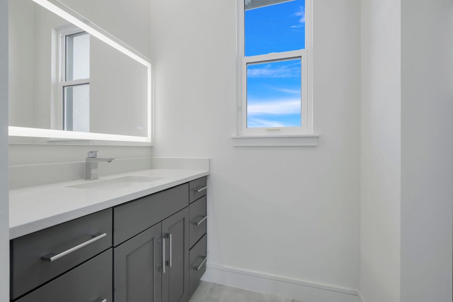 Representative furnished interior of a home built from the Courtyard 50 by ABD Development in Hampton Green at Providence, Davenport (Image 19).