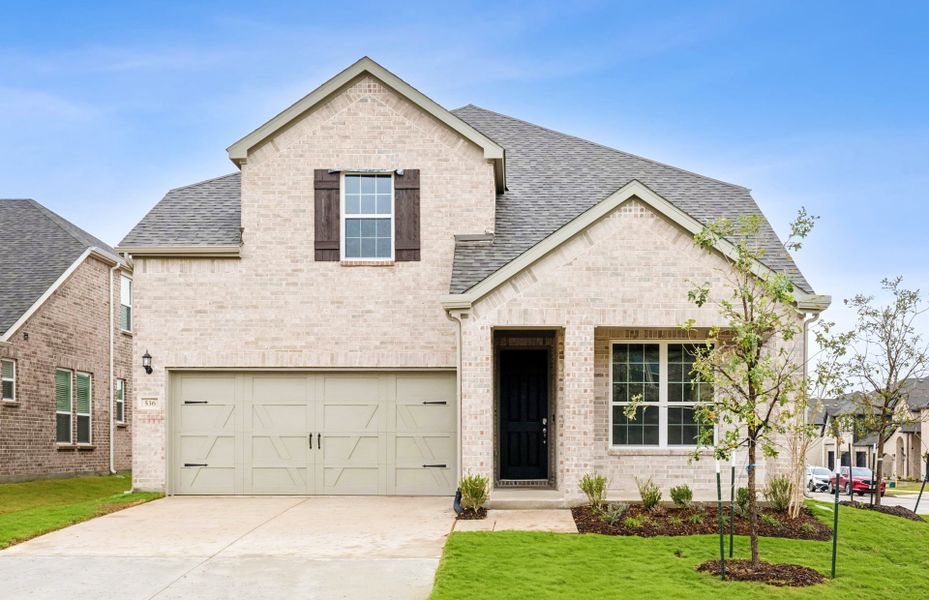 The Riverdale, a two-story home with 2-car garage, shown as Home Exterior A