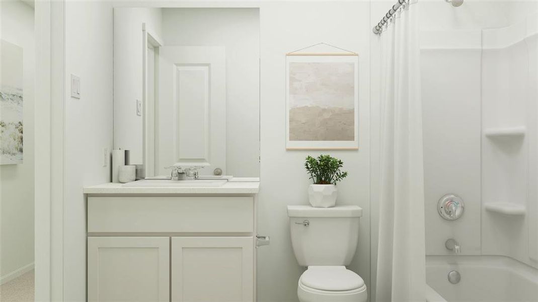 Full bathroom featuring vanity, bathtub / shower combination, and toilet