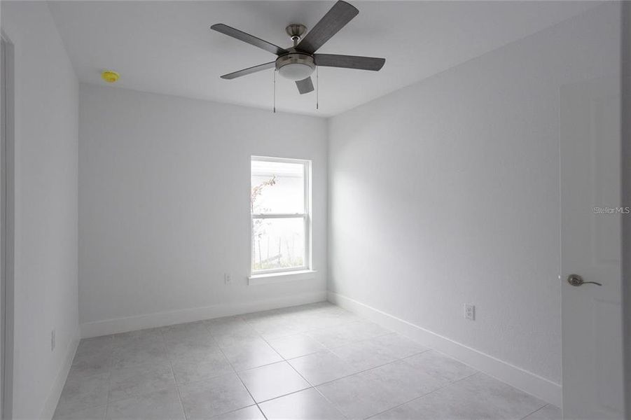 Spacious, unfurnished interior of a new home in , Port Charlotte (Image 18).
