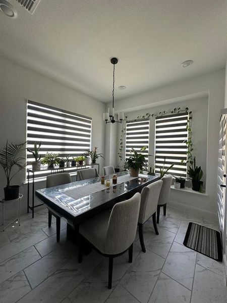 Dining room featuring a chandelier