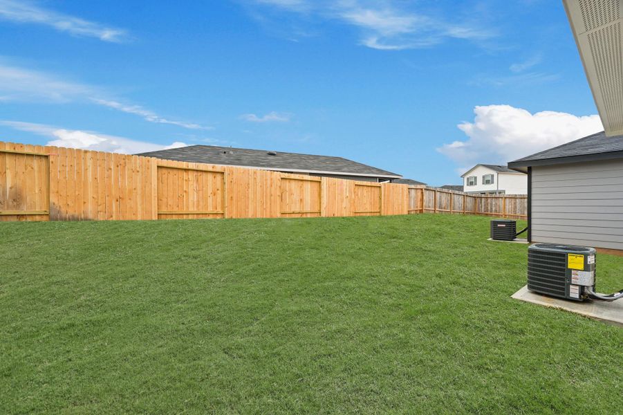 Exterior details and patio area of a home in Castles Edge, Willis (Image 3).