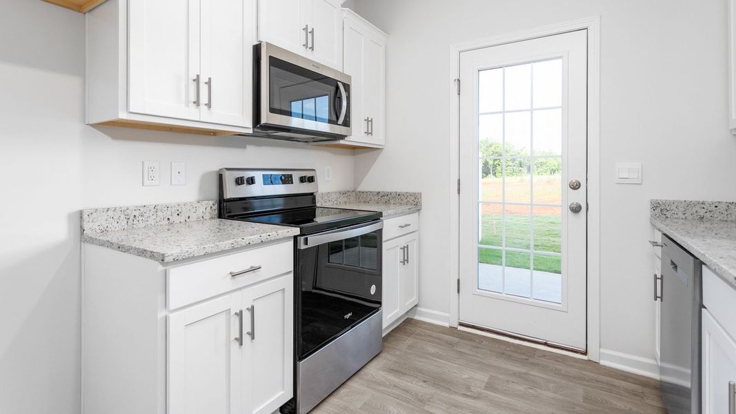 Furnished interior view inside a new home in Henley Ridge, Graham (Image 8).