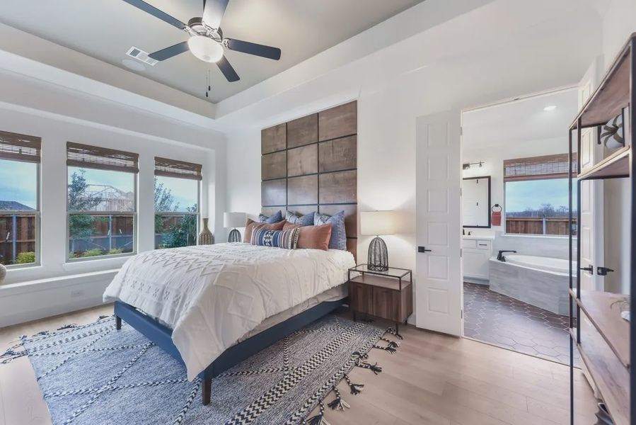 Representative furnished interior of a home built from the Laurel by Chesmar Homes in Canyon Falls, Argyle (Image 5).
