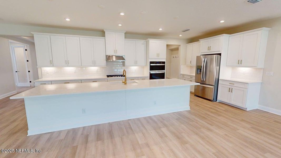 Furnished interior view inside a new home in RiverTown - WaterSong, St. Johns (Image 4).