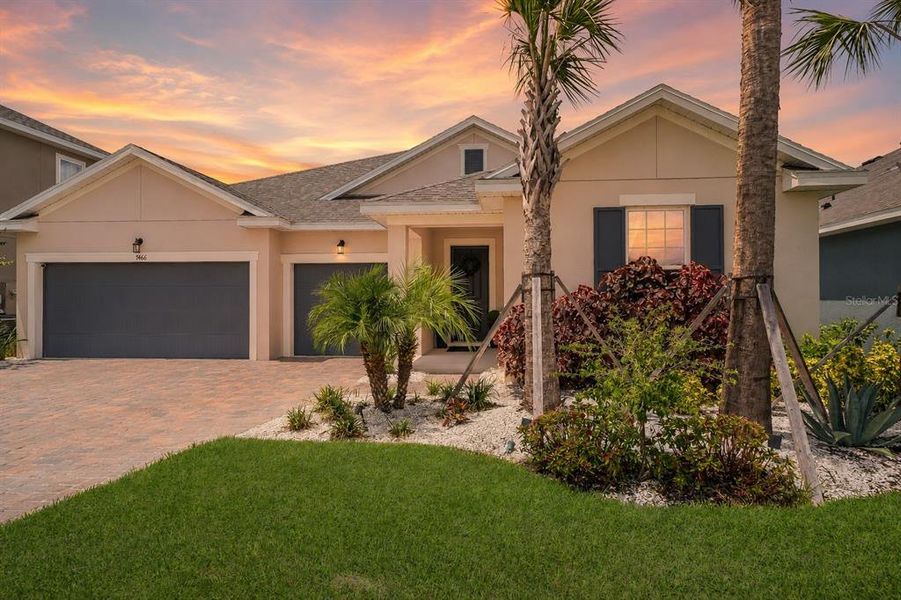 Front exterior of a new home in Seaire, Parrish, FL, highlighting curb appeal (Image 25). Front exterior of a new home in Seaire, Parrish, FL, highlighting curb appeal (Image 25).