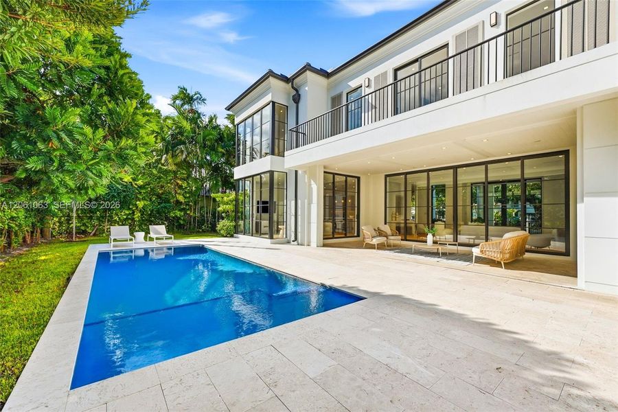Exterior details and patio area of a home in , Coral Gables (Image 41).