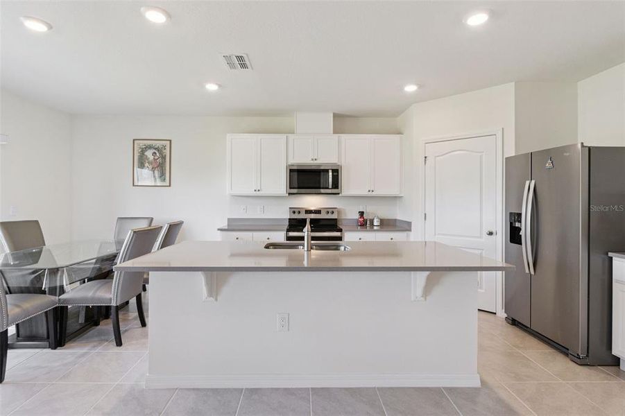 Furnished interior view inside a new home in Harmony at Lake Eloise, Winter Haven (Image 9).