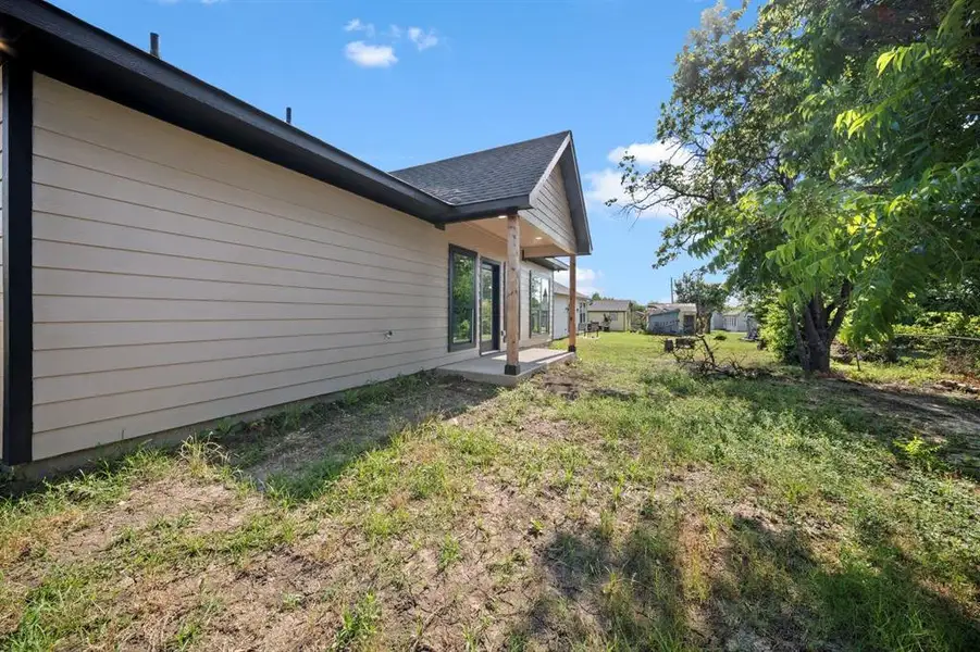 Exterior details and patio area of a home in , Ferris (Image 3).