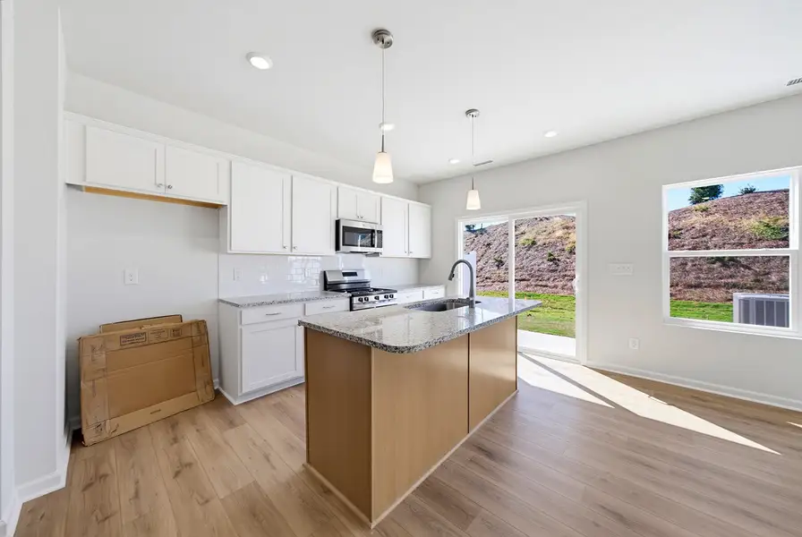 Furnished interior view inside a new home in Sweetbrier, Durham (Image 6).