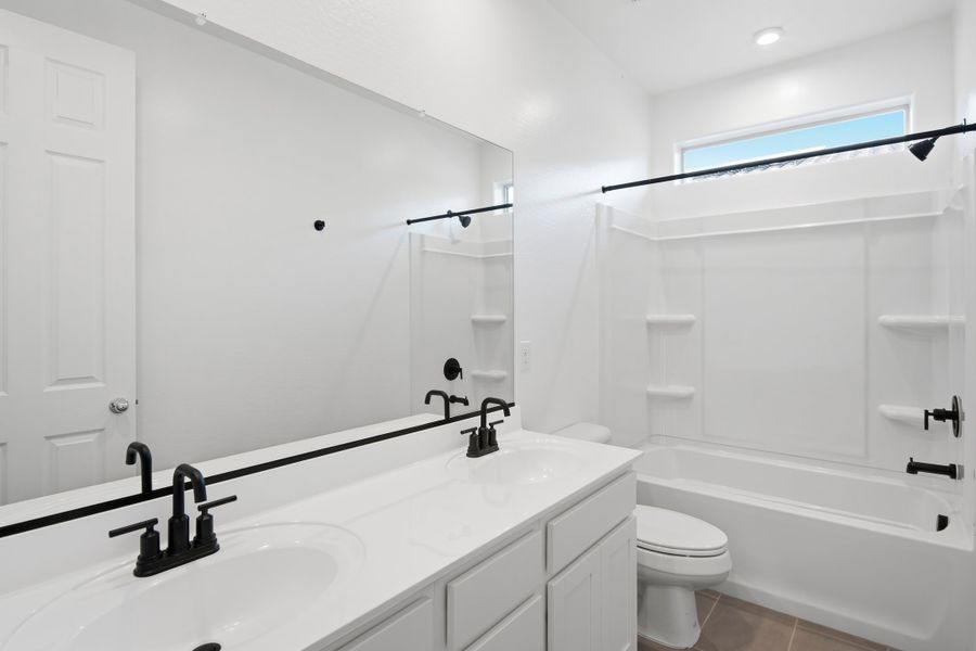 Furnished interior view inside a new home in Marbella at Windrose, Waddell (Image 13).