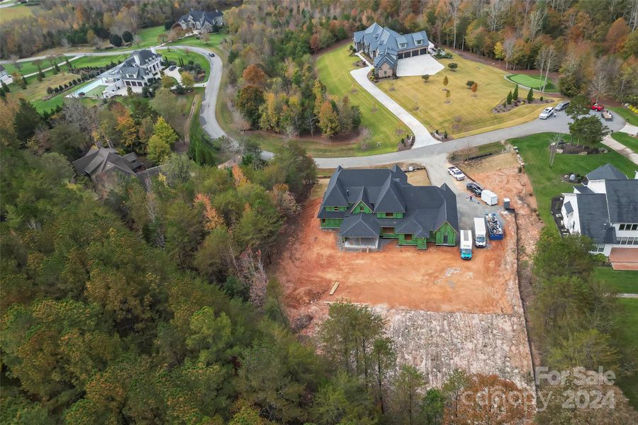 Entertainers dream backyard - imagine sitting in your living room and looking out through your triple slider wall to the flagstone rear porch and beyond to your dream pool all on the same level.  You'll love inviting guests and entertaining here.