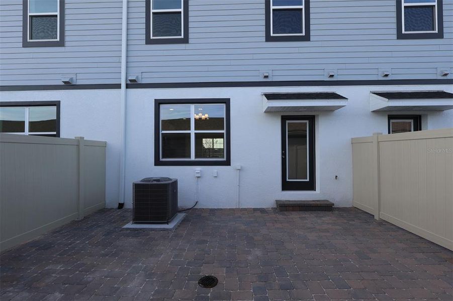 Exterior details and patio area of a home in Center Lake on the Park, St. Cloud (Image 3). Exterior details and patio area of a home in Center Lake on the Park, St. Cloud (Image 3).