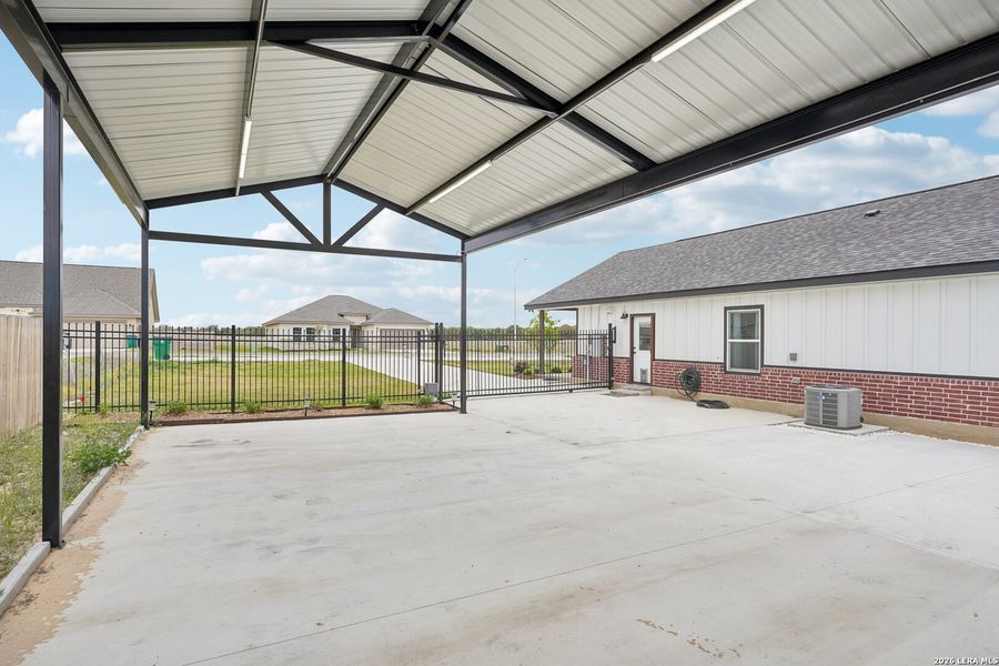 Exterior details and patio area of a home in , La Vernia (Image 22).