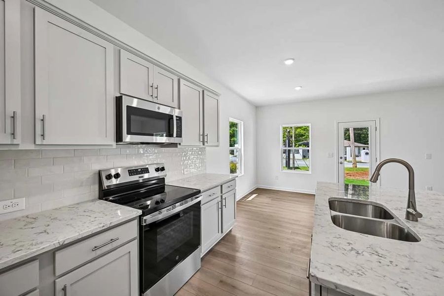 Kitchen featuring Milan Collection Finishes