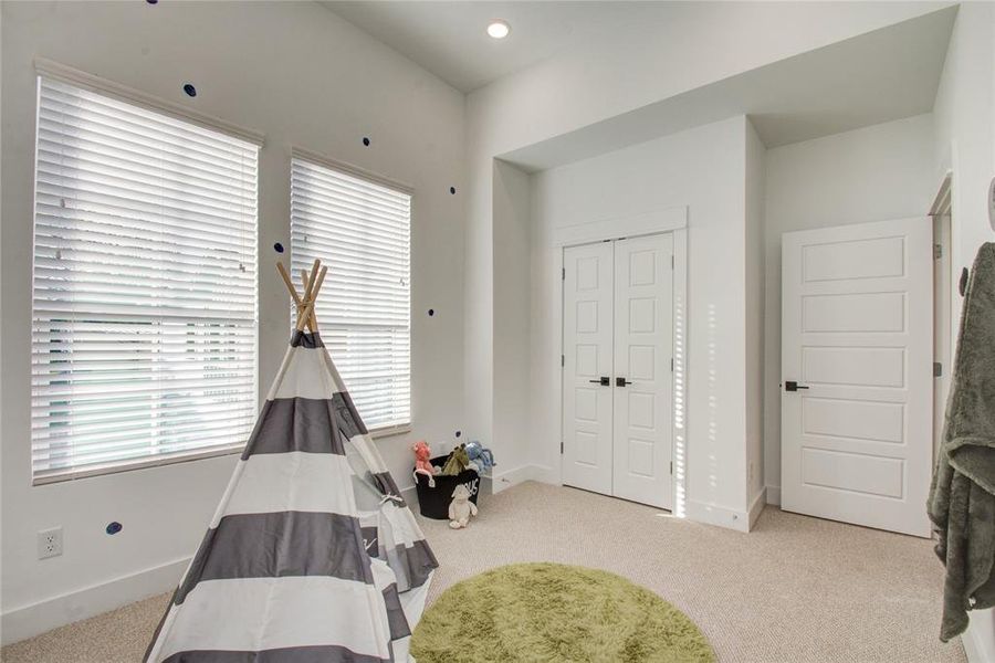 Come and see the high ceilings this secondary bedroom has! Model home photos, finishes and floor plan MAY VARY! Ceiling fans are NOT INCLUDED!