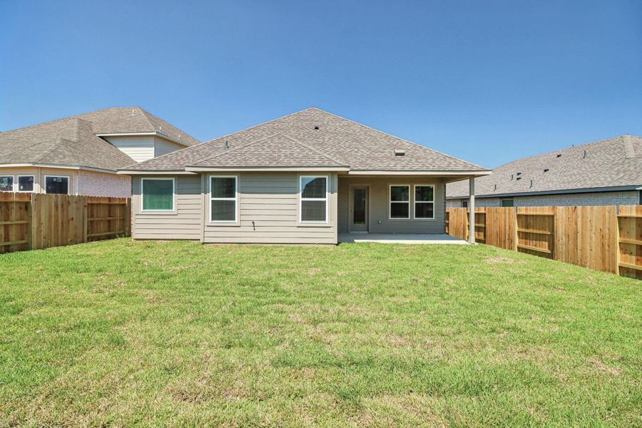 Exterior details and patio area of a home in Pine Lake Cove - Classic Series, Montgomery (Image 2).