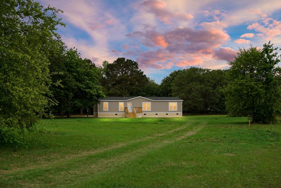 Exterior details and patio area of a home in , Eutawville (Image 29).