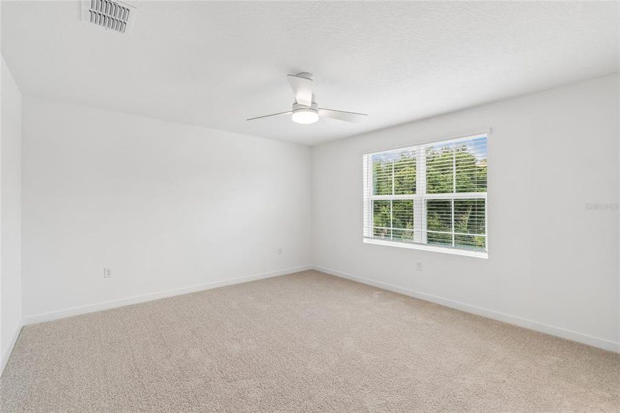 Spacious, unfurnished interior of a new home in Aspire at Canter Creek, Davenport (Image 18).