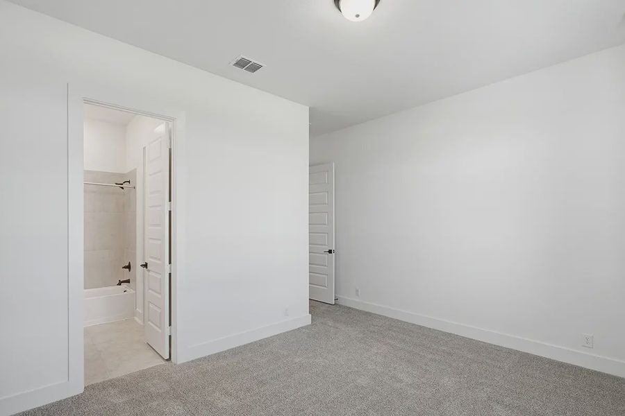 Representative unfurnished interior of a home built from the Kingston by Chesmar Homes in Prominence 60's, San Antonio (Image 23).