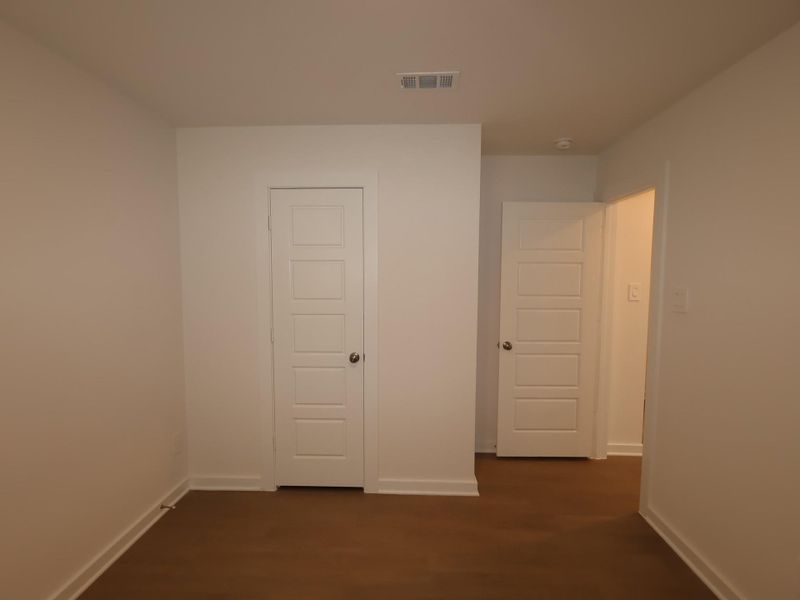 Spacious, unfurnished interior of a new home in Pinewood at Grand Texas, New Caney (Image 27). Spacious, unfurnished interior of a new home in Pinewood at Grand Texas, New Caney (Image 27).