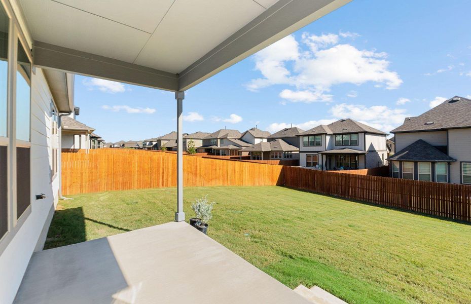 Exterior details and patio area of a home in Saddleback at Santa Rita Ranch, Liberty Hill (Image 19). Exterior details and patio area of a home in Saddleback at Santa Rita Ranch, Liberty Hill (Image 19).