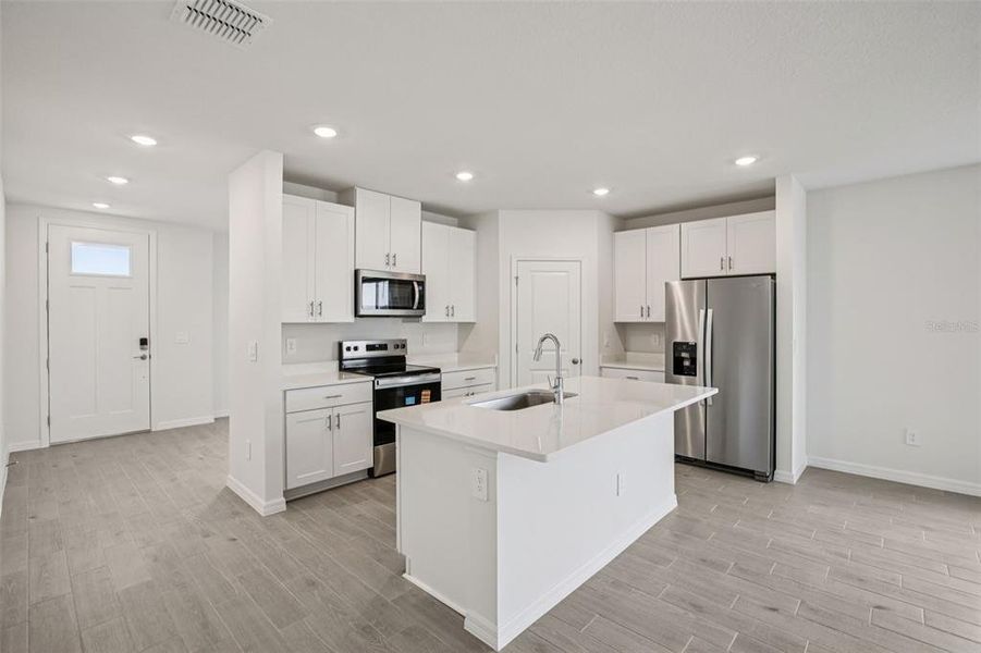 Furnished interior view inside a new home in Two Rivers - Classic Series, Zephyrhills (Image 5).