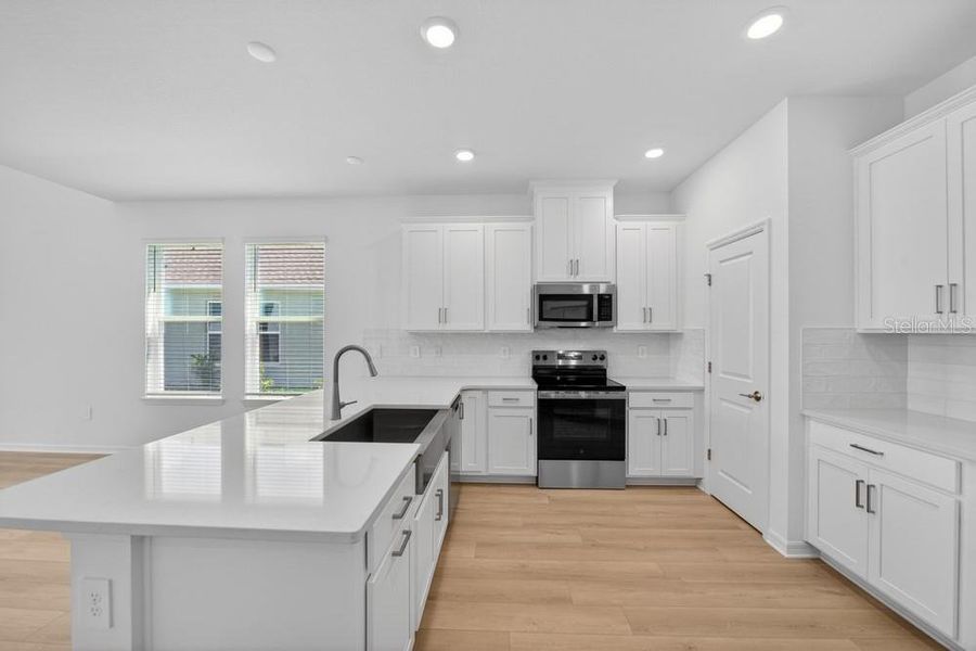 Furnished interior view inside a new home in Westview, Poinciana (Image 31).