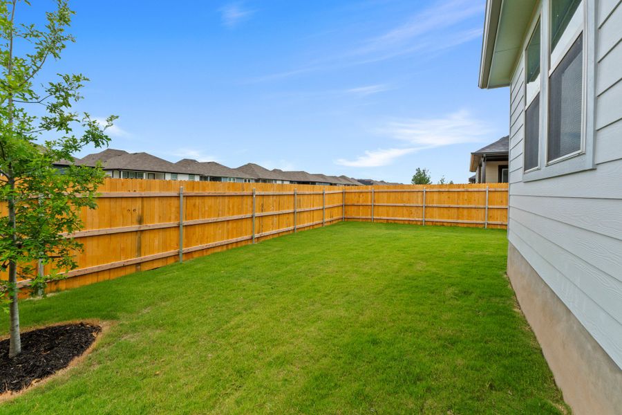 Exterior details and patio area of a home in Prairie Winds, Hutto (Image 4).