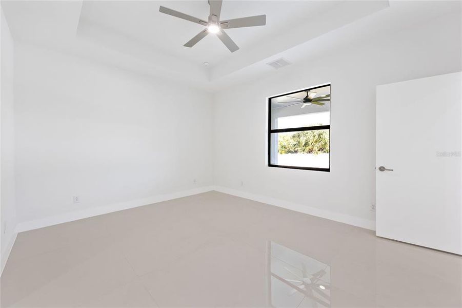 Spacious, unfurnished interior of a new home in , Port Charlotte (Image 34).