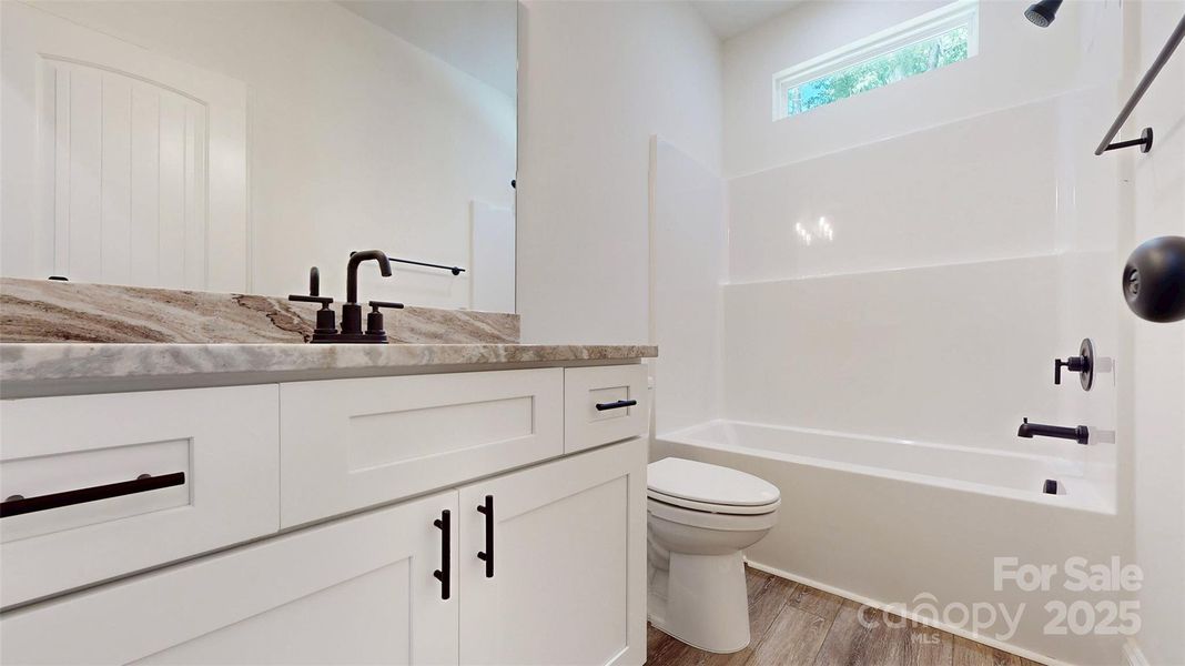 Furnished interior view inside a new home in , Waxhaw (Image 14).