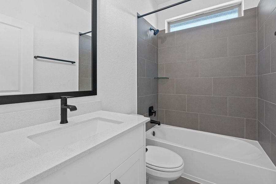 Bathroom with shower / bath combination and vanity Bathroom with shower / bath combination and vanity