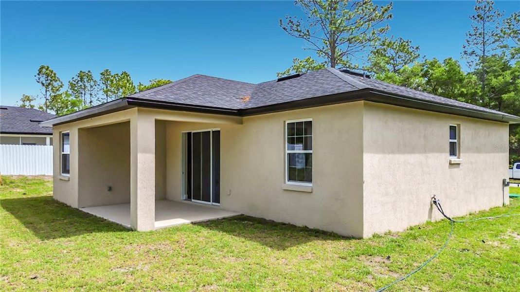 Exterior details and patio area of a home in , Citrus Springs (Image 30).