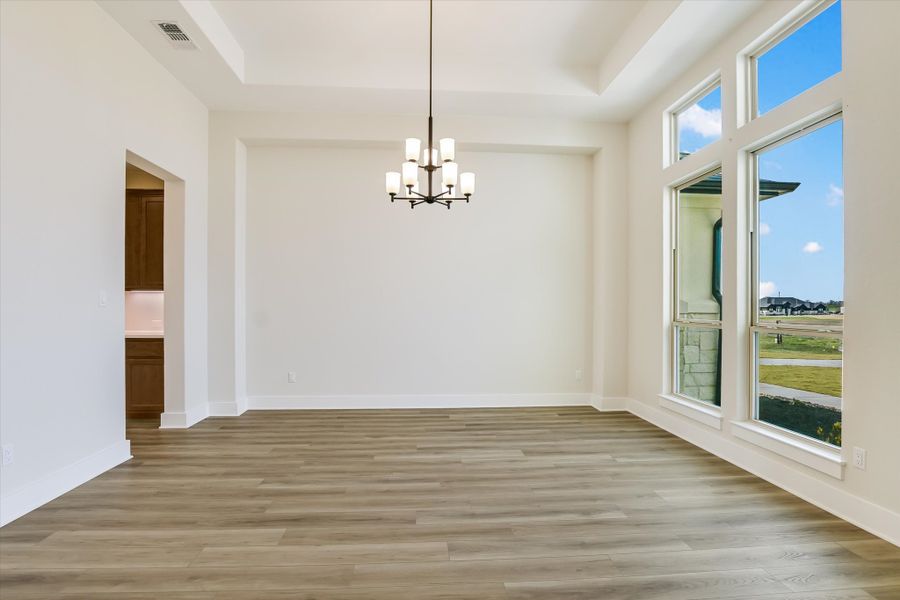 Representative unfurnished interior of a home built from the Avalon by Giddens Homes in Scofield Farms Estates, Georgetown (Image 211).