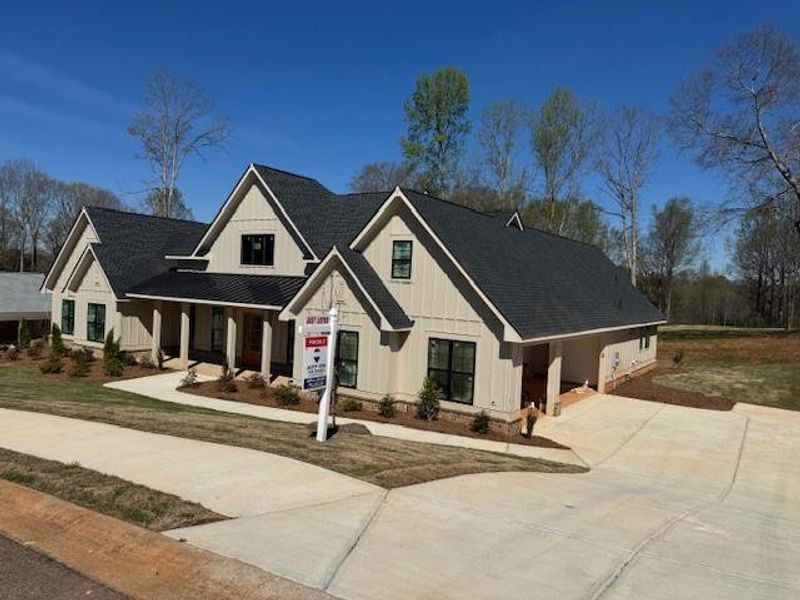 Front exterior of a new home in , Commerce, GA, highlighting curb appeal (Image 2). Front exterior of a new home in , Commerce, GA, highlighting curb appeal (Image 2).
