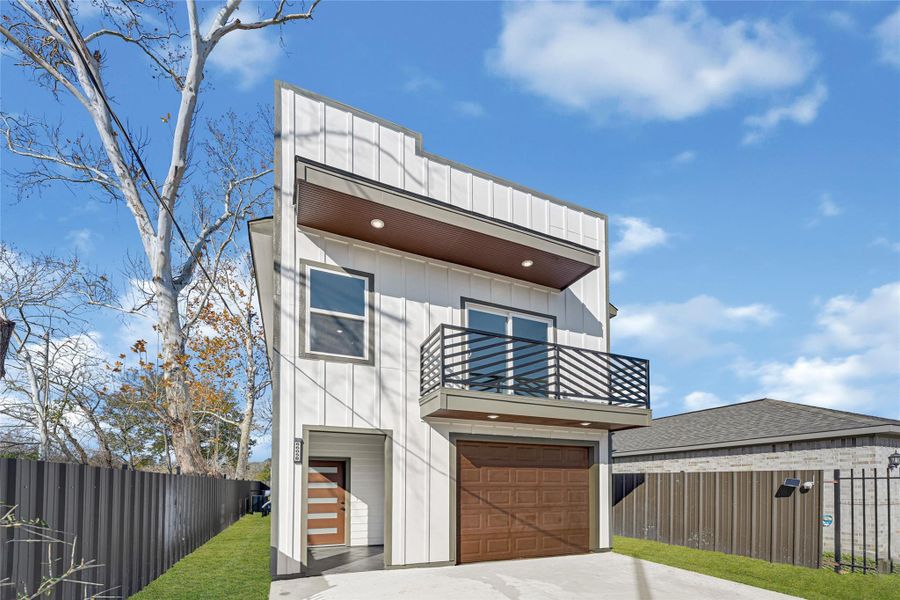 plenty of parking space, with over size garage door