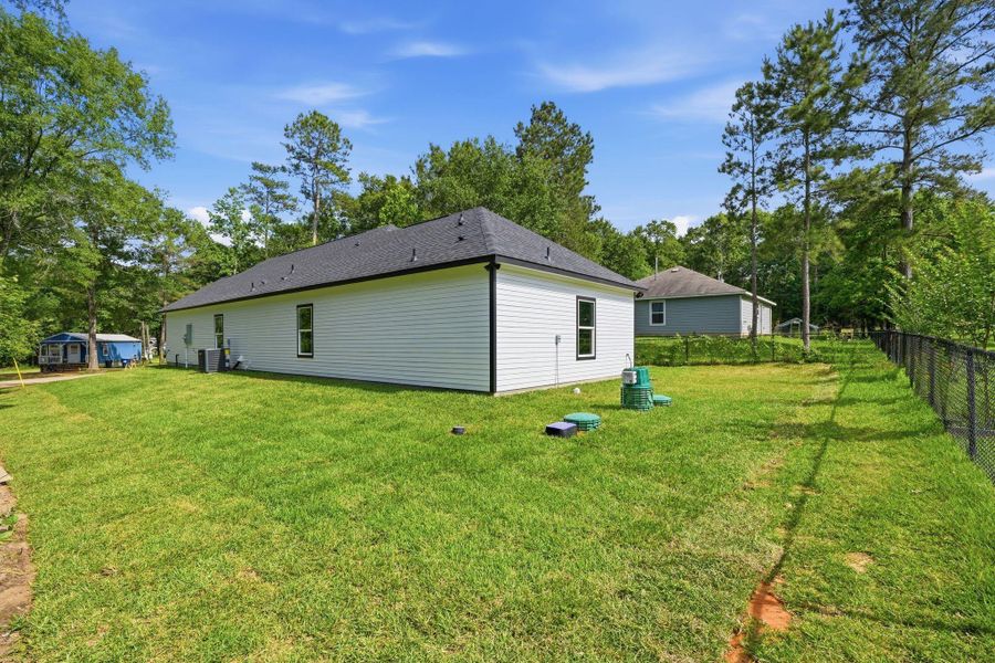 Exterior details and patio area of a home in , Willis (Image 23).