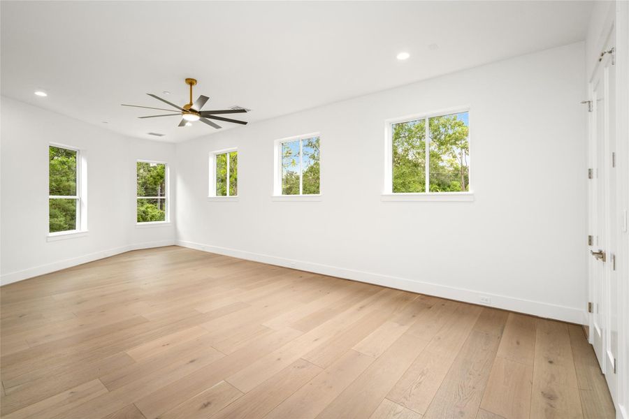 This space is tailor-made for a vibrant game room—envision a shuffleboard beneath the elevated windows, a pool table at center stage, and a large TV for game day viewing. And no need to add a bar—it's already built-in, ready for effortless entertaining. This space is tailor-made for a vibrant game room—envision a shuffleboard beneath the elevated windows, a pool table at center stage, and a large TV for game day viewing. And no need to add a bar—it's already built-in, ready for effortless entertaining.