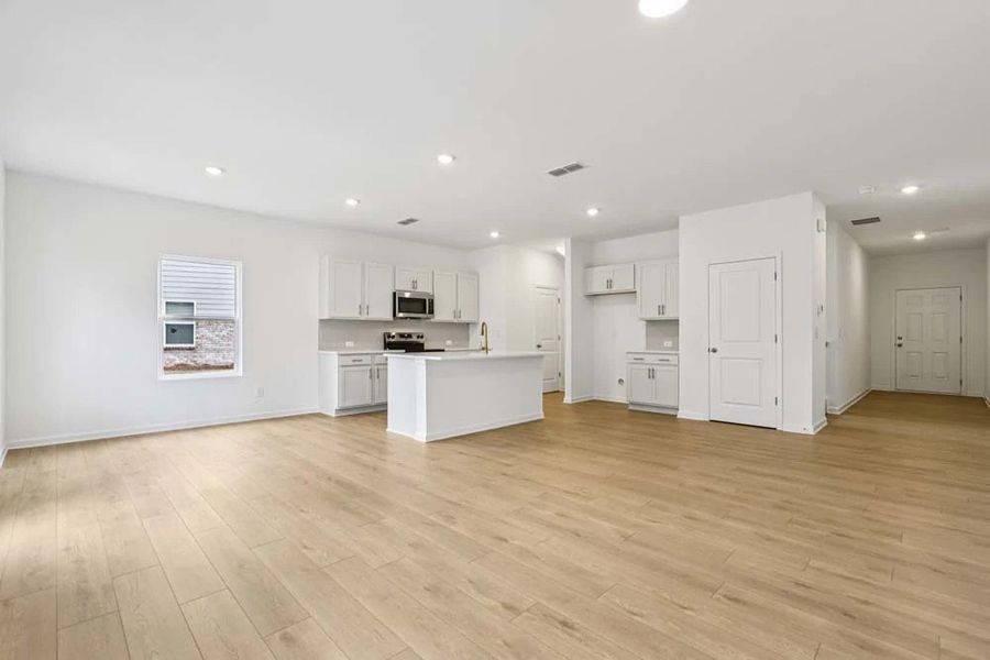 Sample Photo: Family Room & Kitchen Sample Photo: Family Room & Kitchen