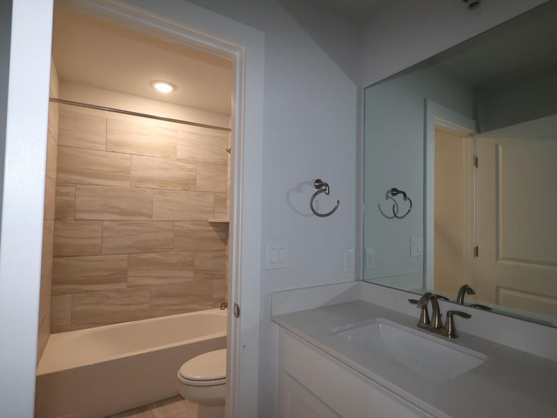 Furnished interior view inside a new home in Edgewood, Leander (Image 8). Furnished interior view inside a new home in Edgewood, Leander (Image 8).