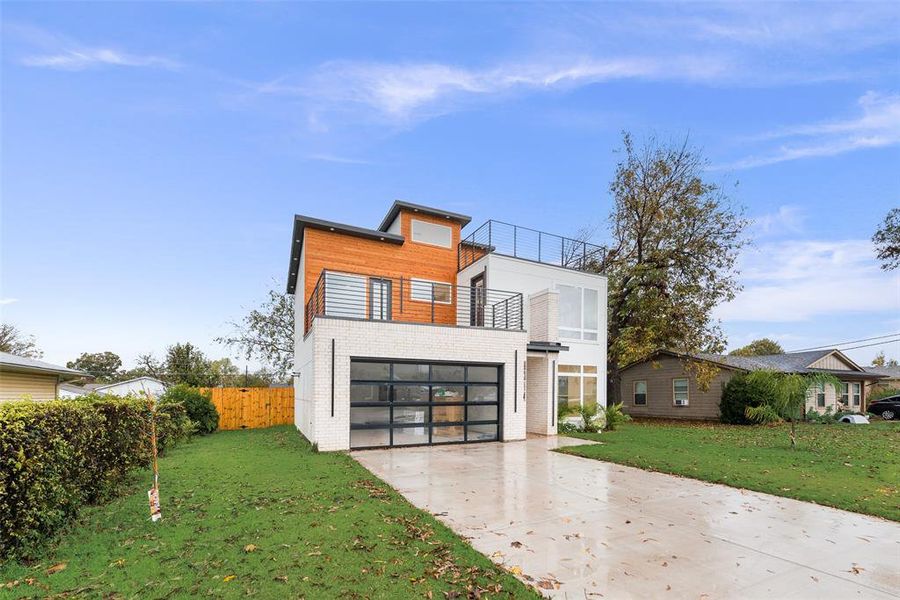 Front exterior of a new home in , Dallas, TX, highlighting curb appeal (Image 2). Front exterior of a new home in , Dallas, TX, highlighting curb appeal (Image 2).