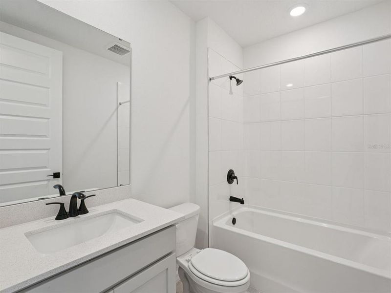 Furnished interior view inside a new home in Oakfield Trails - Signature Series, Parrish (Image 11). Furnished interior view inside a new home in Oakfield Trails - Signature Series, Parrish (Image 11).