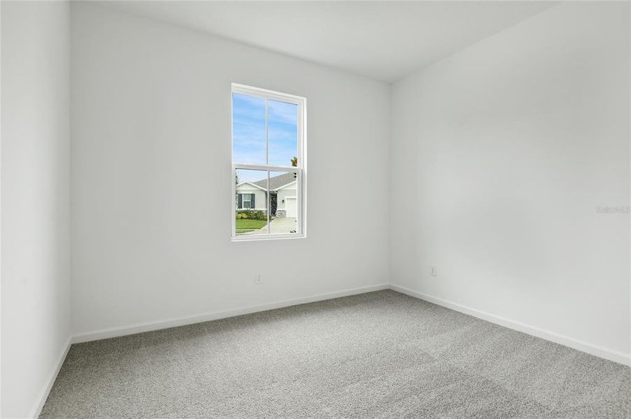 Spacious, unfurnished interior of a new home in Seasons at Grandview Gardens, Deland (Image 10).