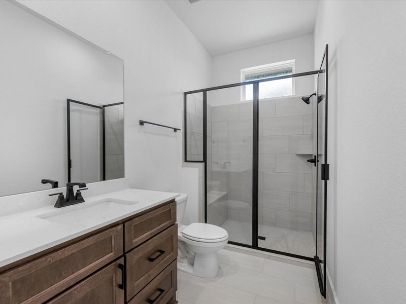 Furnished interior view inside a new home in Woodson’s Reserve, Spring (Image 7).