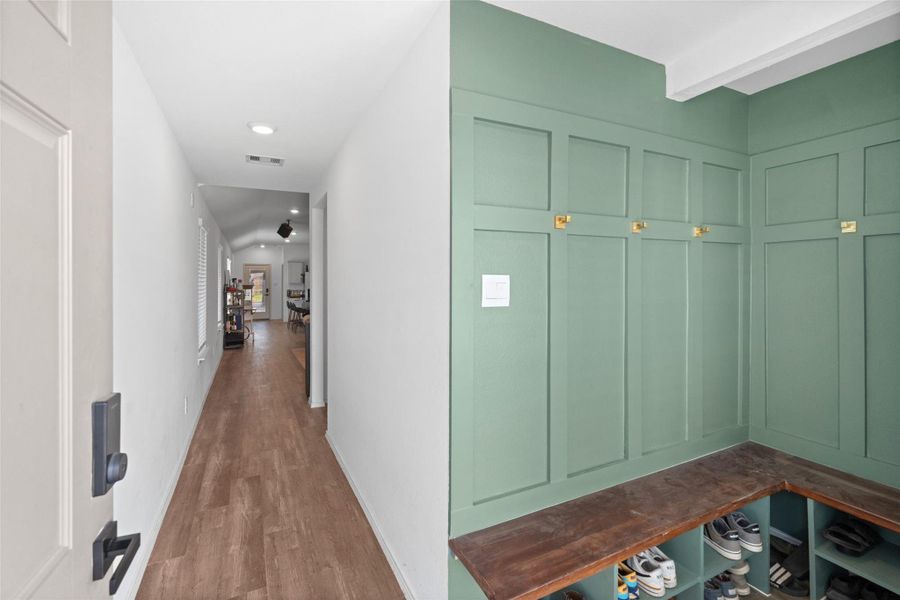 Re-imagined entry where there was once a small closet. Re-imagined entry where there was once a small closet.