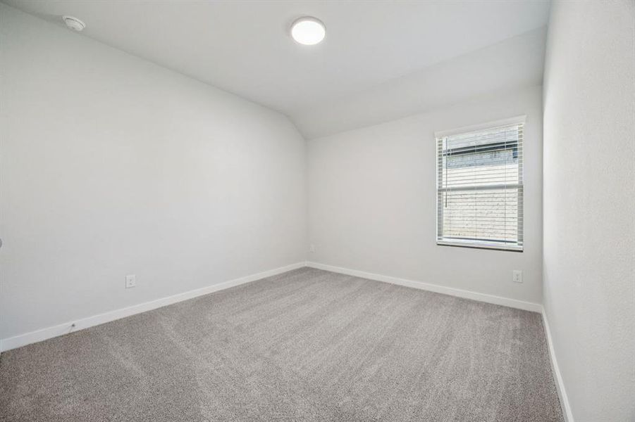 Bedroom in the Heisman home plan by Trophy Signature Homes – REPRESENTATIVE PHOTO Bedroom in the Heisman home plan by Trophy Signature Homes – REPRESENTATIVE PHOTO